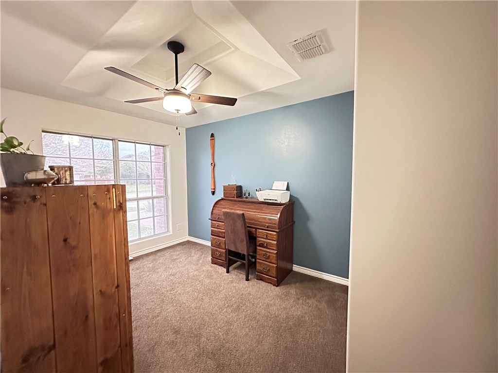 2106 Brook Lane Kingsville, TX 78363 - Photo 32 of 38 a view of a workspace with furniture and a window
