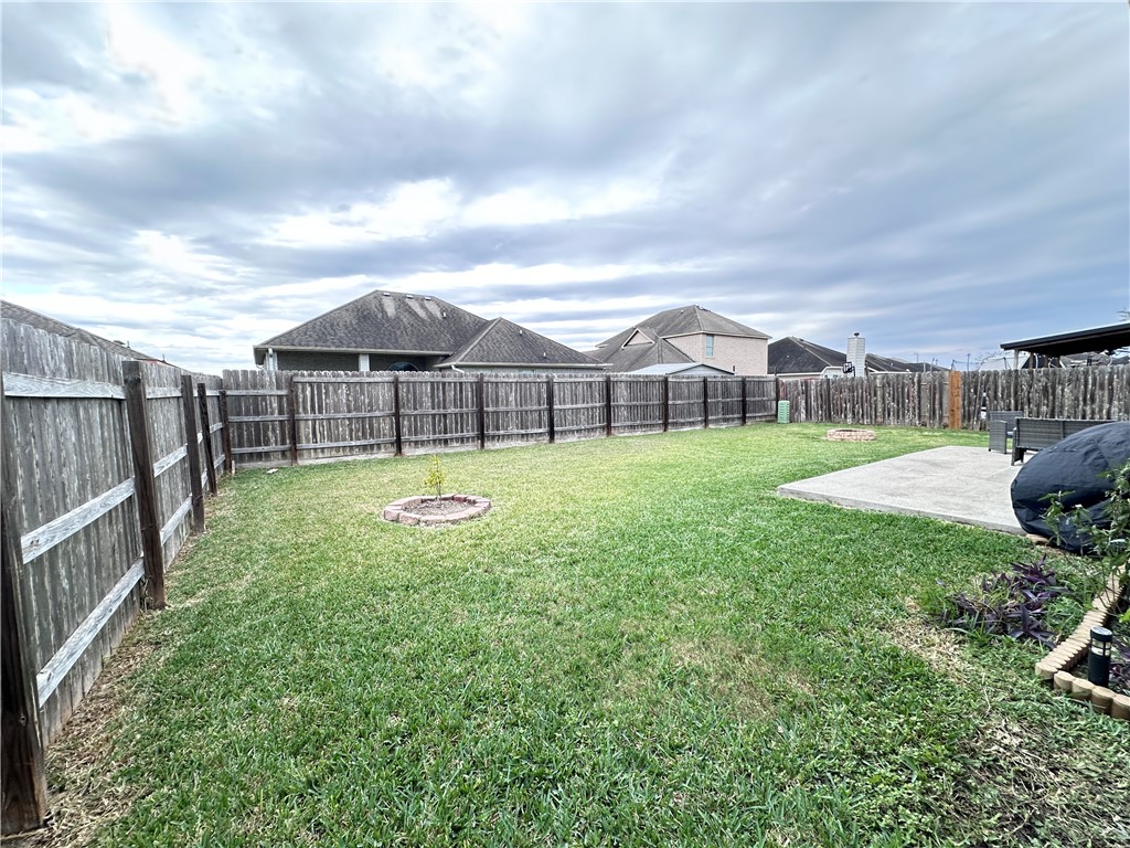 2106 Brook Lane Kingsville, TX 78363 - Photo 36 of 38 a view of a garden with a slide and a garden