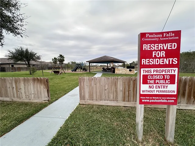 a sign on the side of the park