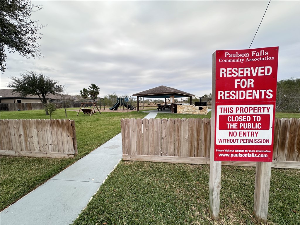 2106 Brook Lane Kingsville, TX 78363 - Photo 5 of 38 a sign on the side of the park