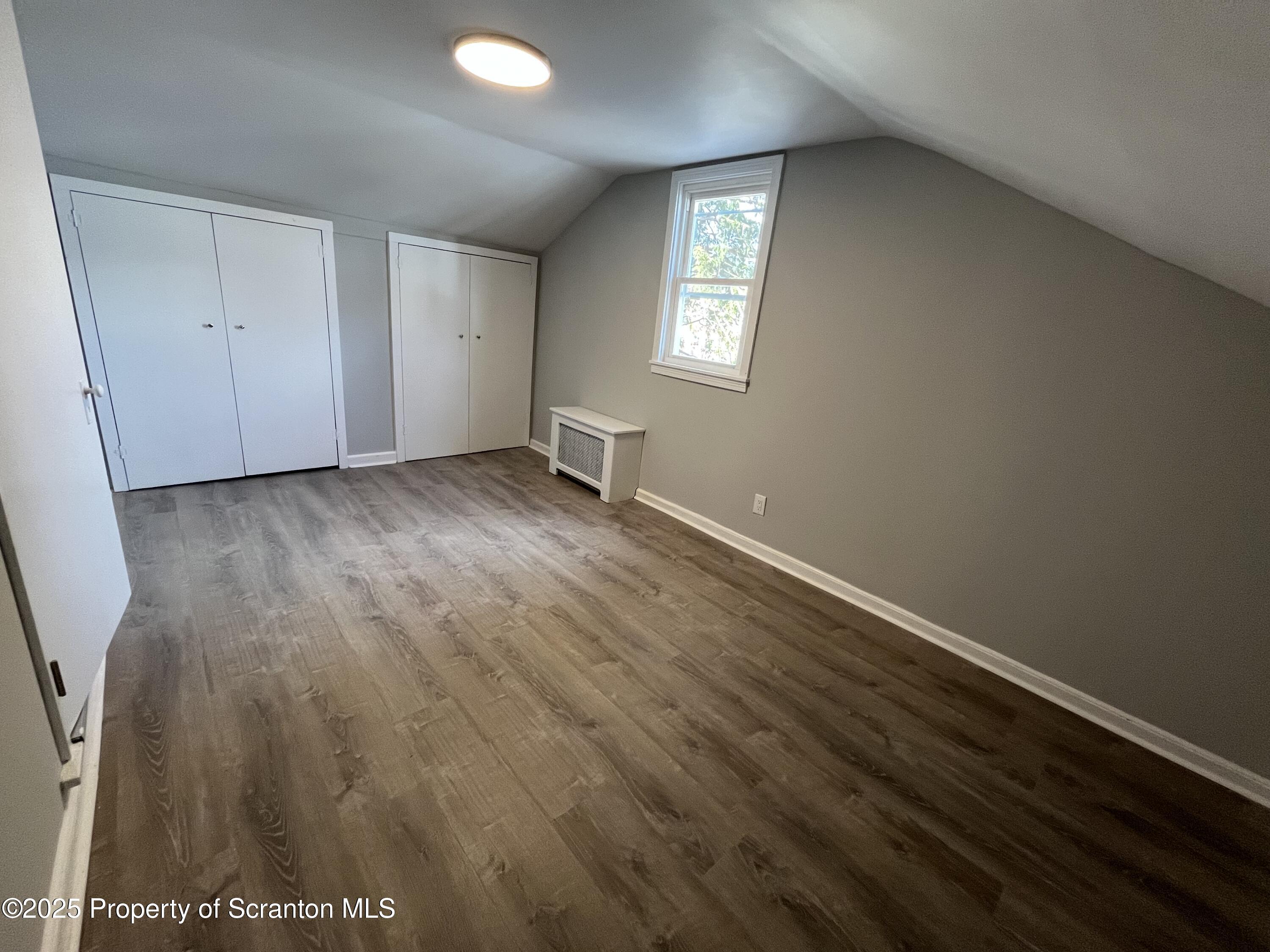 909 Battle Street Scranton, PA 18508 - Photo 10 of 13 an empty room with windows