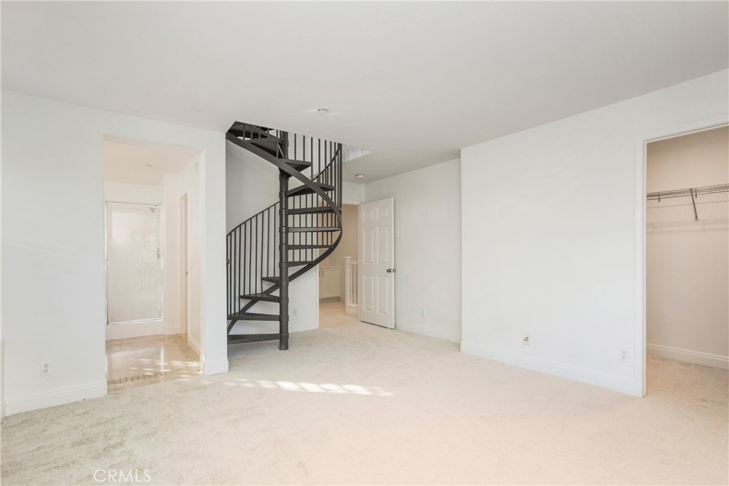 40 Platinum Circle Ladera Ranch, CA 92694 - Photo 12 of 15 a view of an empty room with stairs
