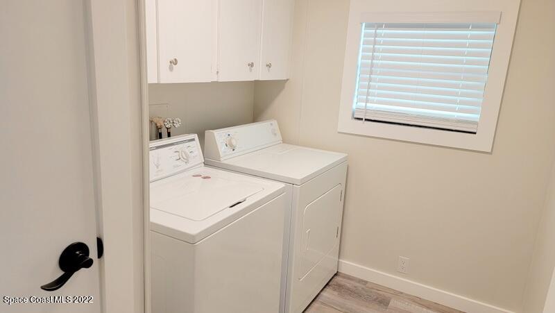 915 Fir Street Sebastian, FL 32976 - Photo 13 of 33 a utility room with dryer and washer