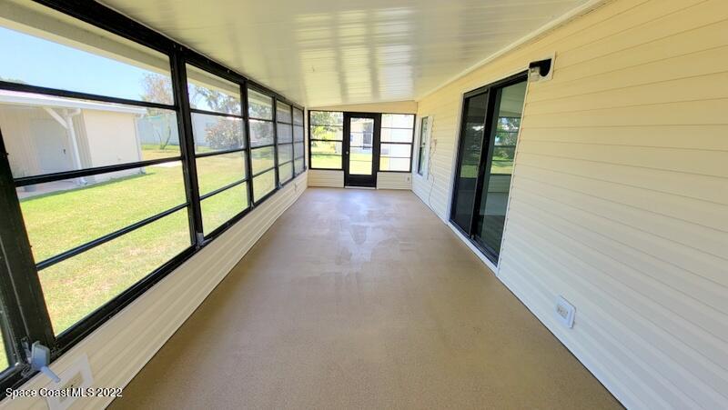 915 Fir Street Sebastian, FL 32976 - Photo 14 of 33 a view of hallway with stairs
