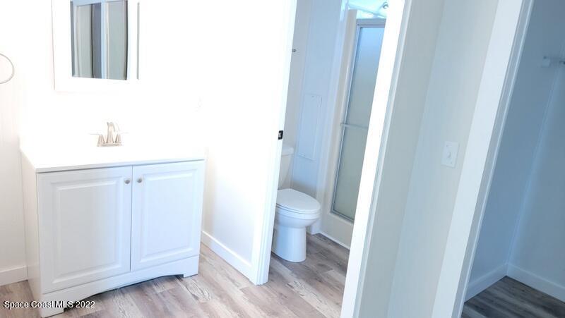 915 Fir Street Sebastian, FL 32976 - Photo 9 of 33 a bathroom with a sink and a toilet