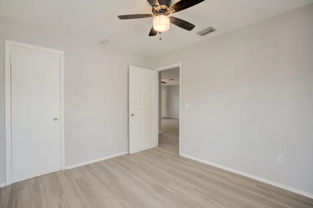 a view of an empty room and window