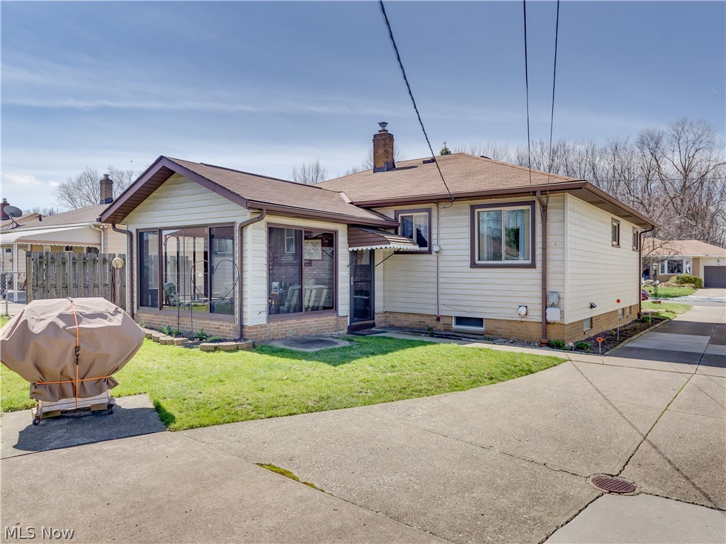 7189 Maplewood Road Parma, OH 44130 - Photo 2 of 20 Rear view showing the 3 Season room.