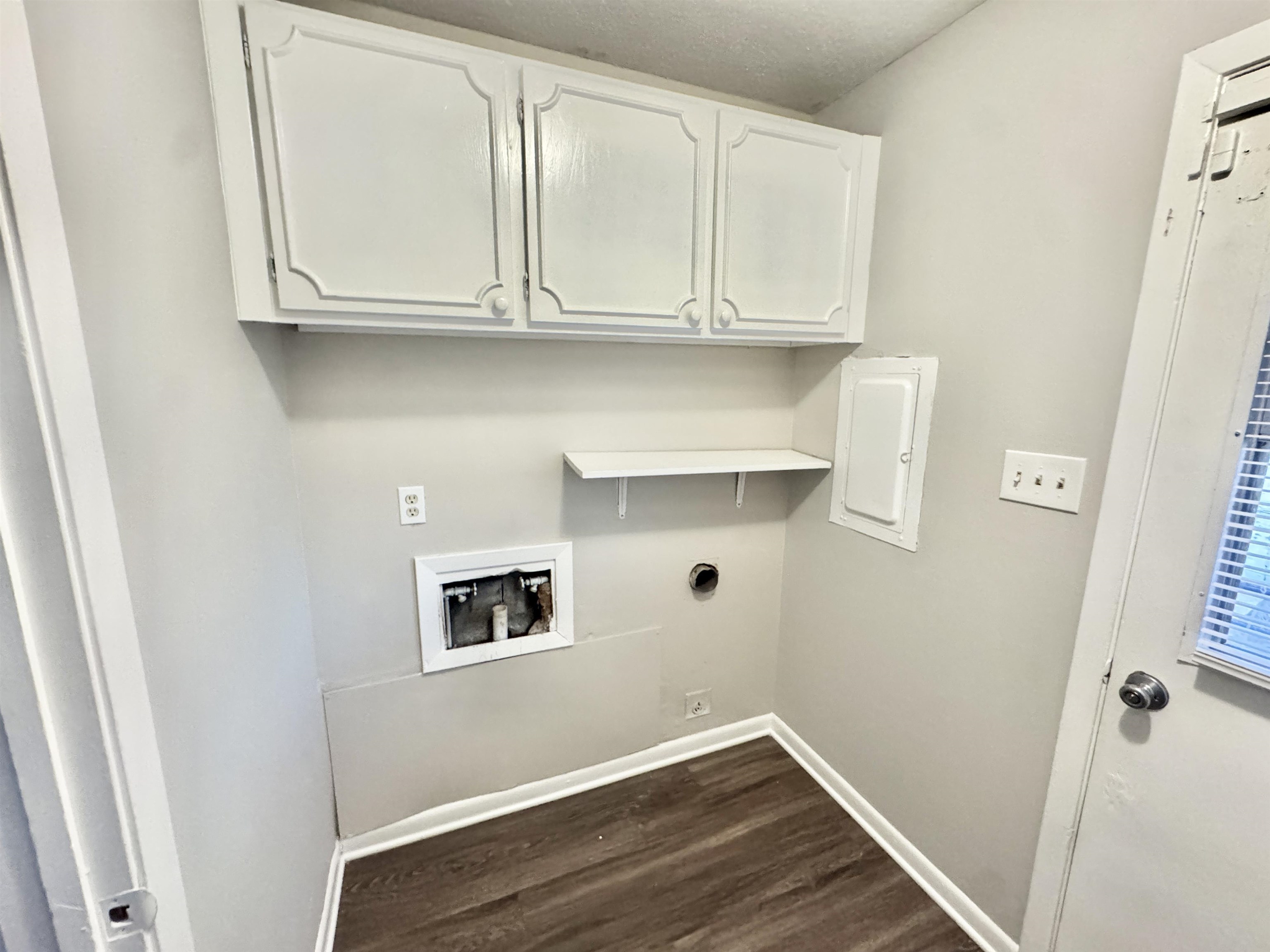 3174 Emerald Street Memphis, TN 38115 - Photo 24 of 28 a view of cabinets and wooden floor