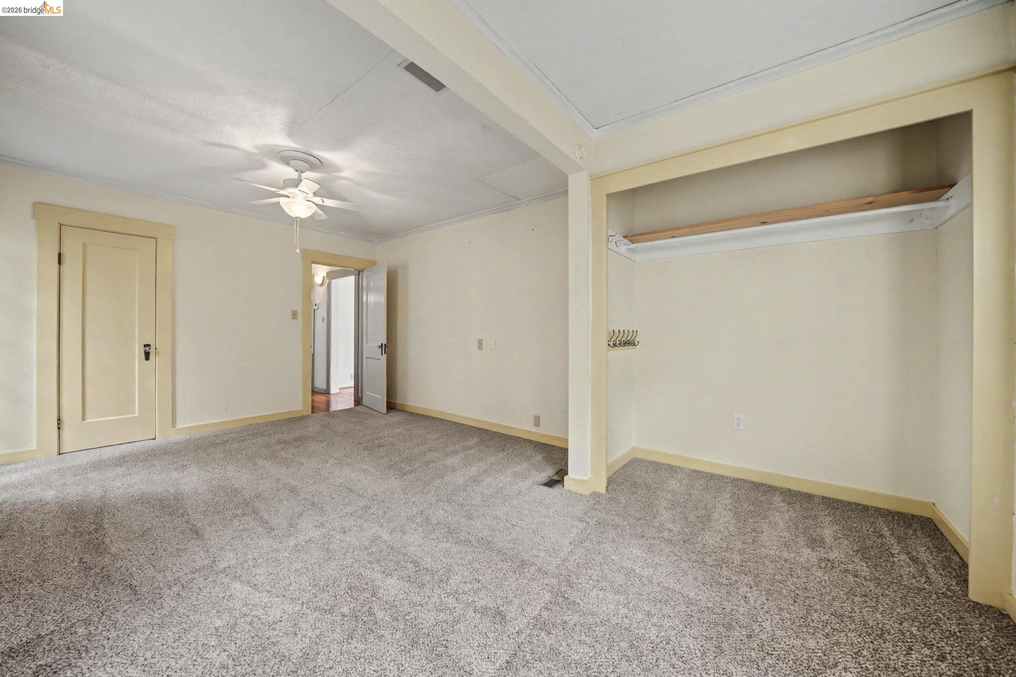 731 Dam Road Murphys, CA 95247 - Photo 28 of 60 a view of an empty room and a ceiling fan