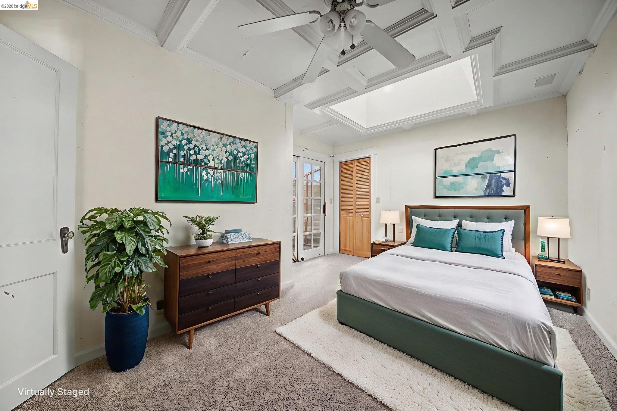 731 Dam Road Murphys, CA 95247 - Photo 33 of 60 a bedroom with a bed and a painting on the wall