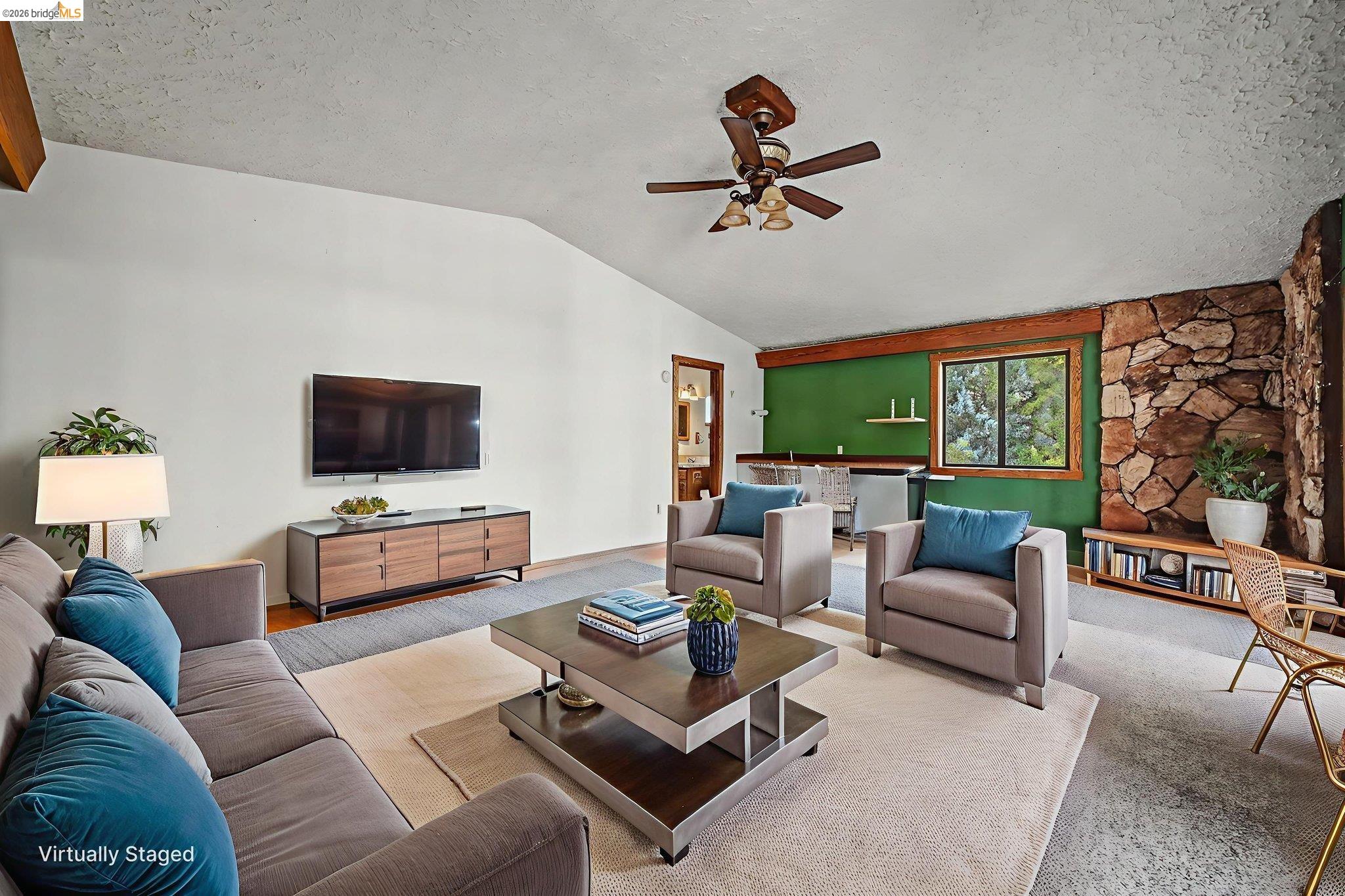 731 Dam Road Murphys, CA 95247 - Photo 38 of 60 a living room with furniture and a flat screen tv