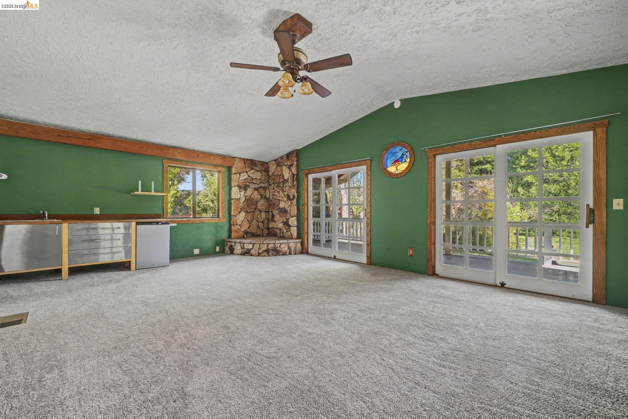 731 Dam Road Murphys, CA 95247 - Photo 39 of 60 a view of a livingroom with furniture ceiling fan and window