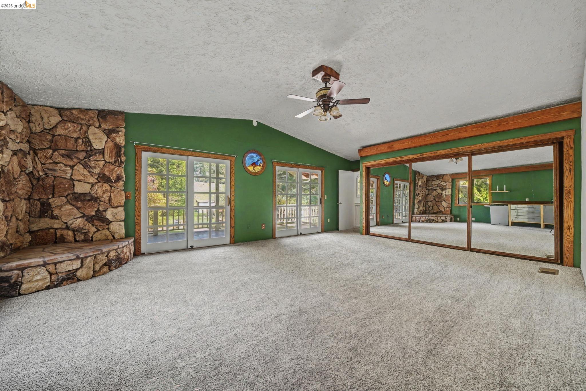 731 Dam Road Murphys, CA 95247 - Photo 41 of 60 a view of a livingroom with an empty space and a fireplace