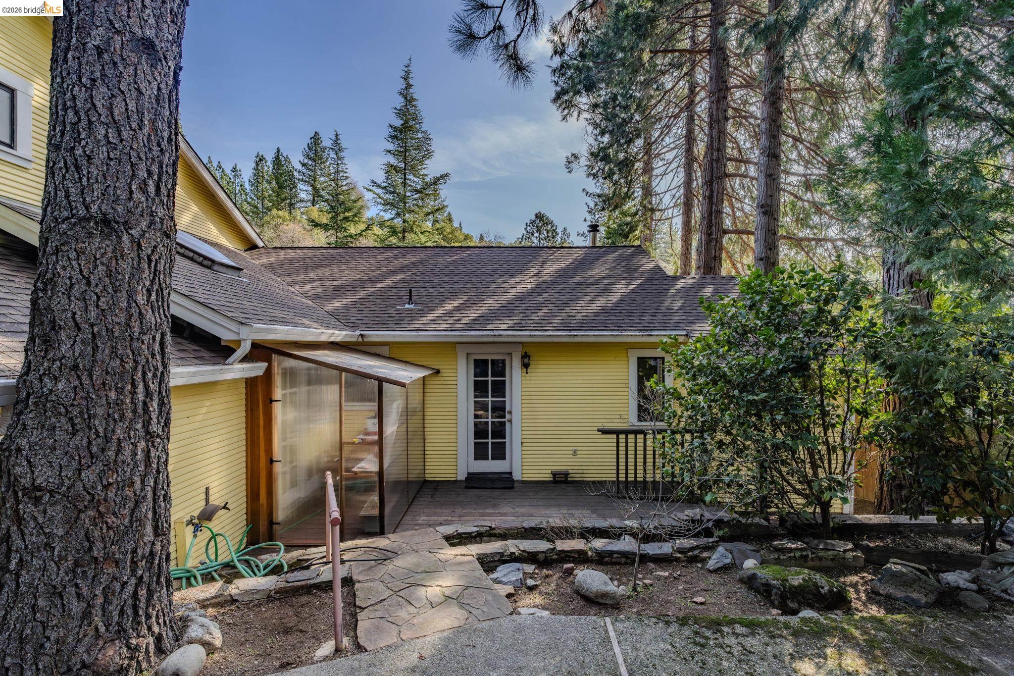 731 Dam Road Murphys, CA 95247 - Photo 48 of 60 a view of a house with a tree in the background