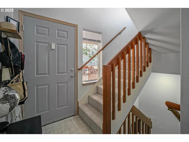 a view of entryway with wooden floor