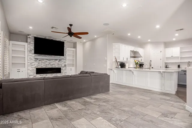 a view of a dining room with furniture and windows