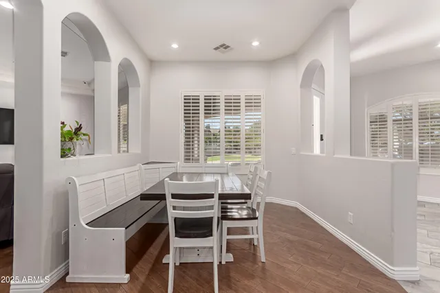 a kitchen that has a sink and a stove in it