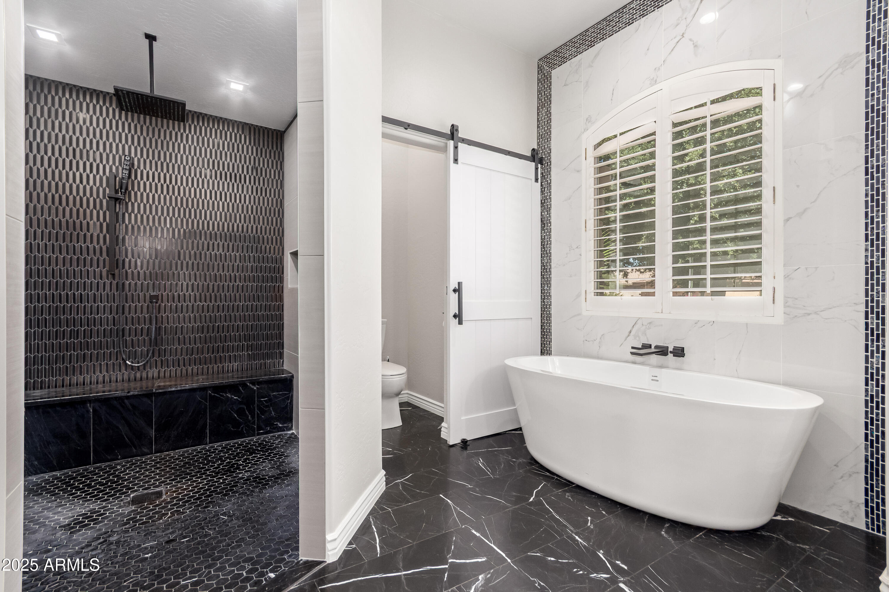 4584 East Reins Road Gilbert, AZ 85297 - Photo 20 of 58 a bathroom with a bathtub and a shower