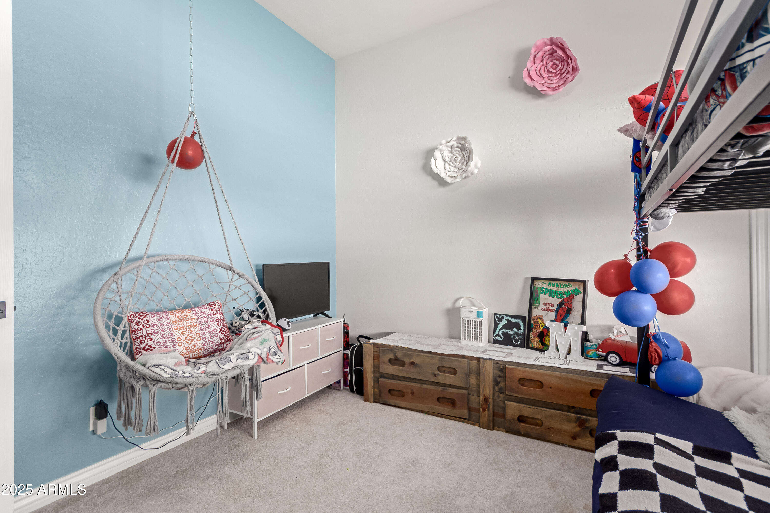 4584 East Reins Road Gilbert, AZ 85297 - Photo 34 of 58 a bedroom with a bed and wooden floor