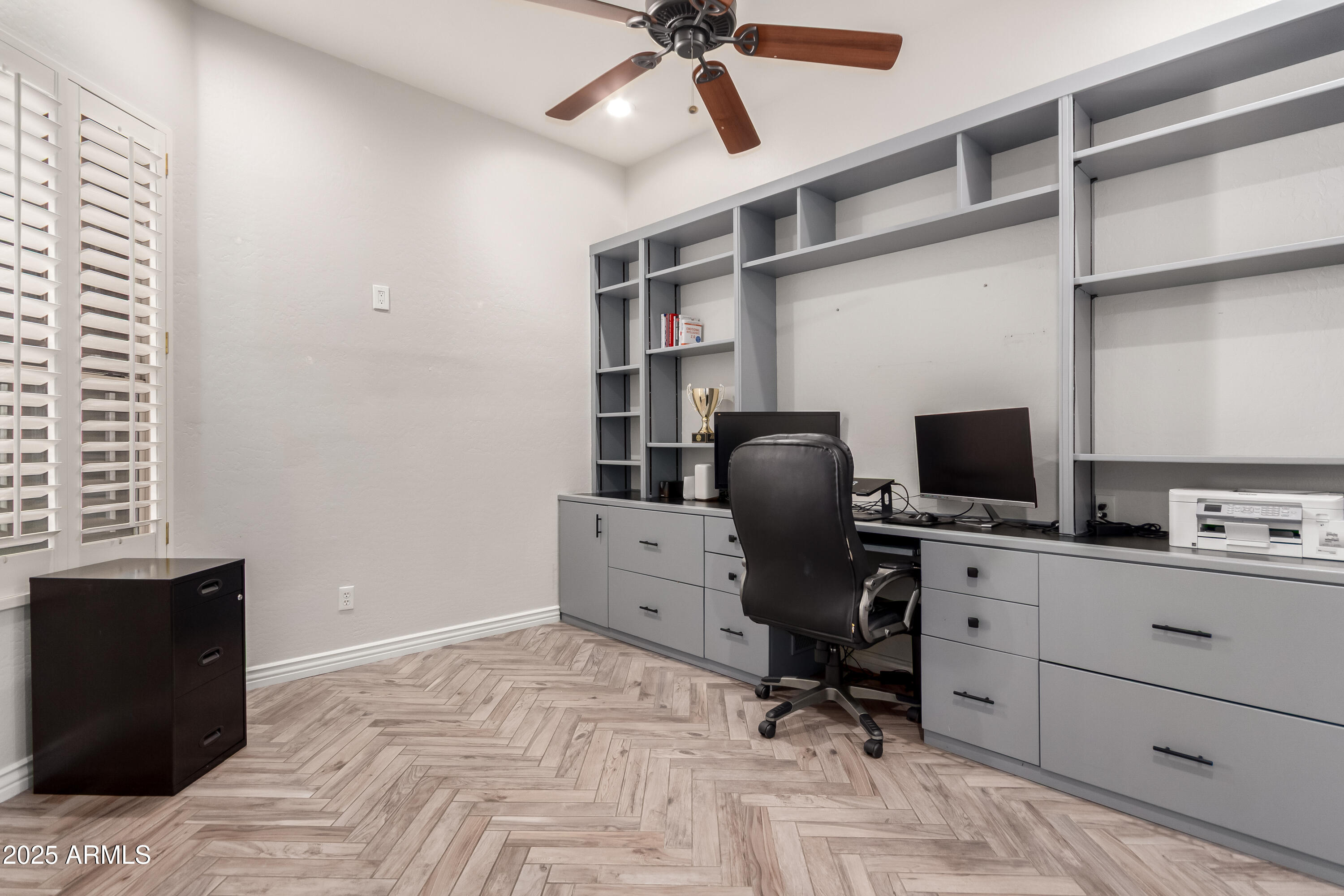 4584 East Reins Road Gilbert, AZ 85297 - Photo 37 of 58 a view of a workspace with furniture