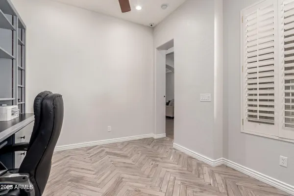 a view of a swimming pool with a yard