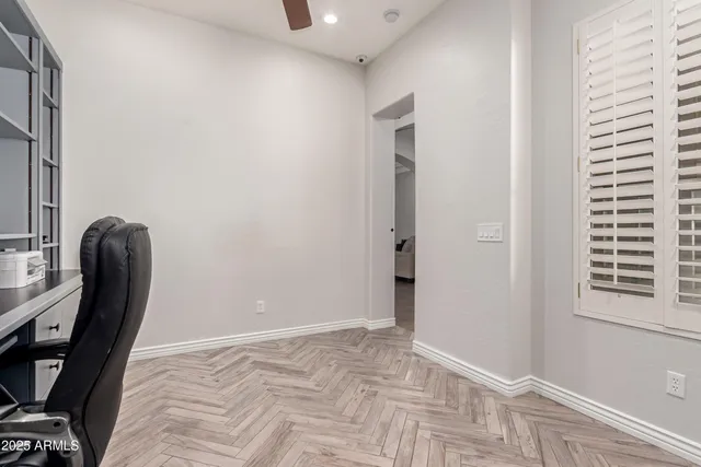 a view of a swimming pool with a yard