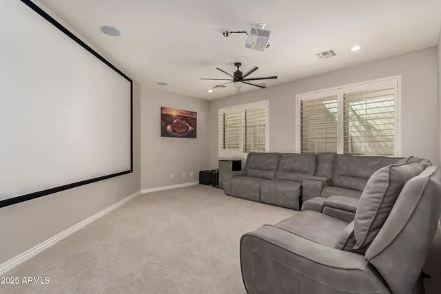 a view of a backyard with potted plants