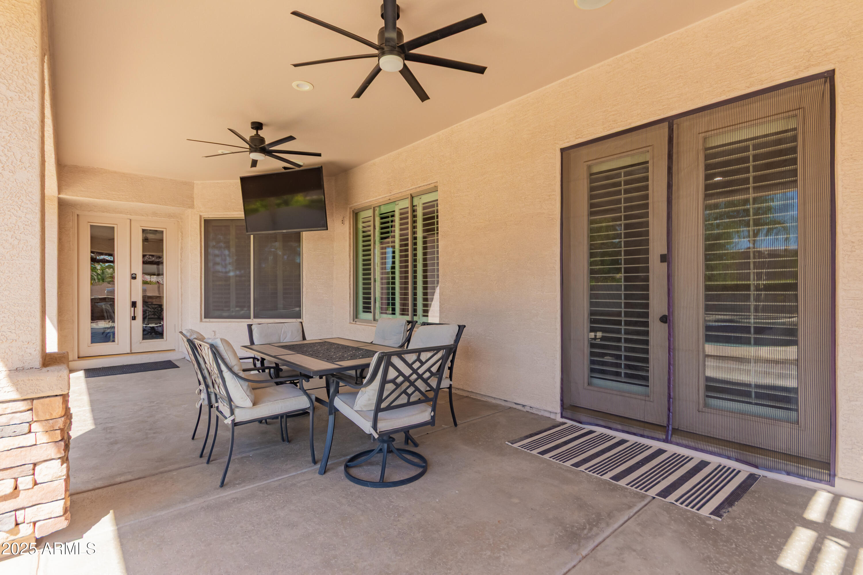 4584 East Reins Road Gilbert, AZ 85297 - Photo 45 of 58 a dining room with furniture and window