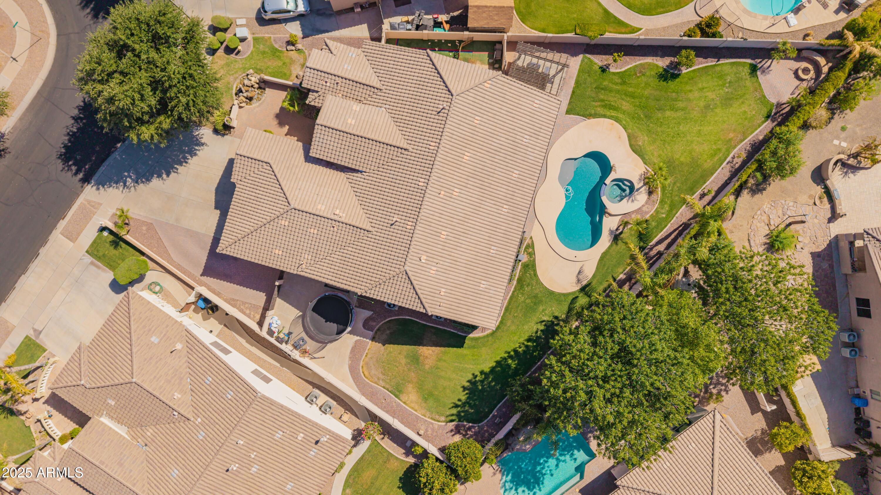 4584 East Reins Road Gilbert, AZ 85297 - Photo 53 of 58 an aerial view of a house with a swimming pool