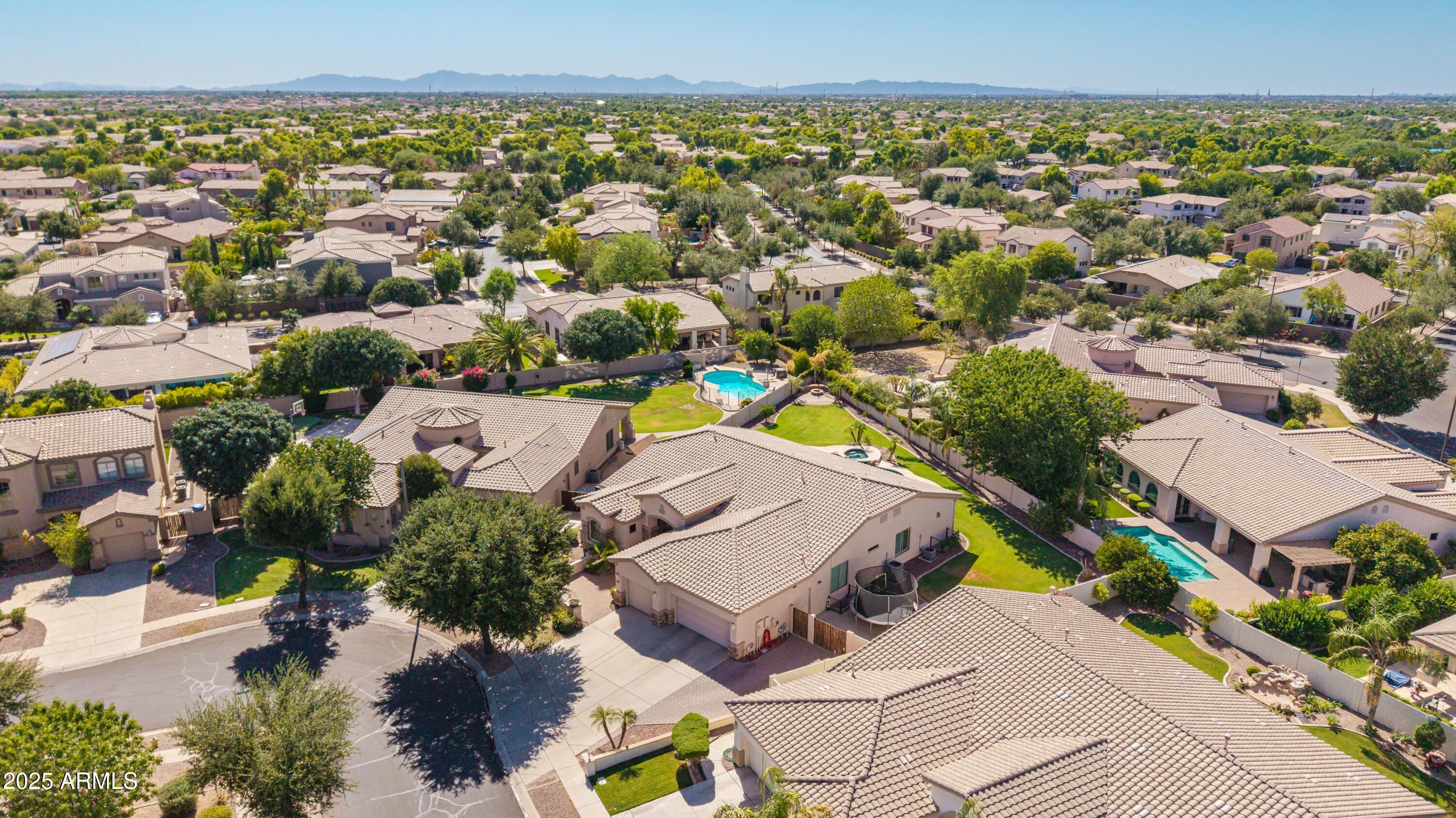 4584 East Reins Road Gilbert, AZ 85297 - Photo 57 of 58 an aerial view of residential houses with outdoor space