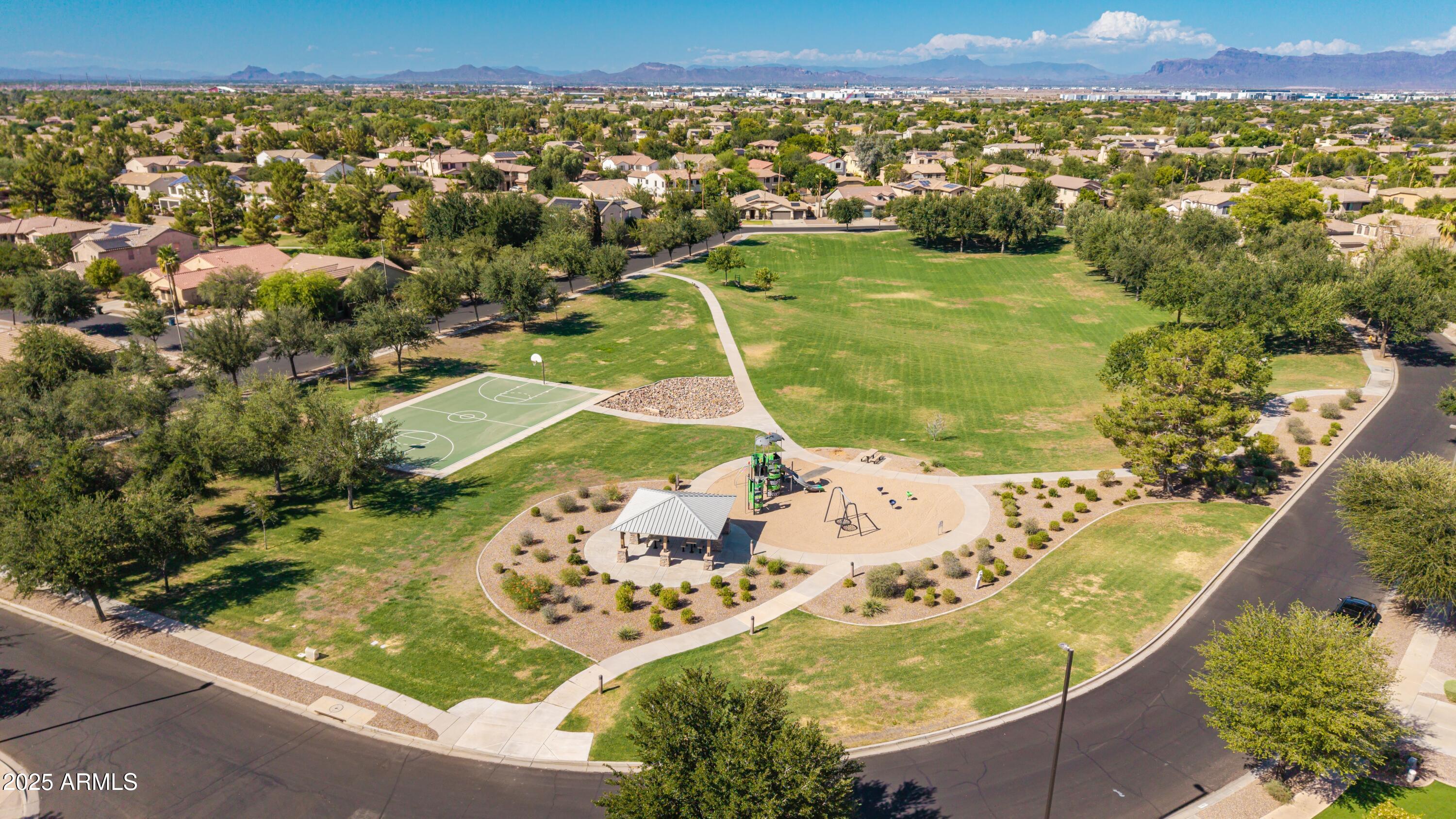 4584 East Reins Road Gilbert, AZ 85297 - Photo 58 of 58 an aerial view of a residential houses with outdoor space