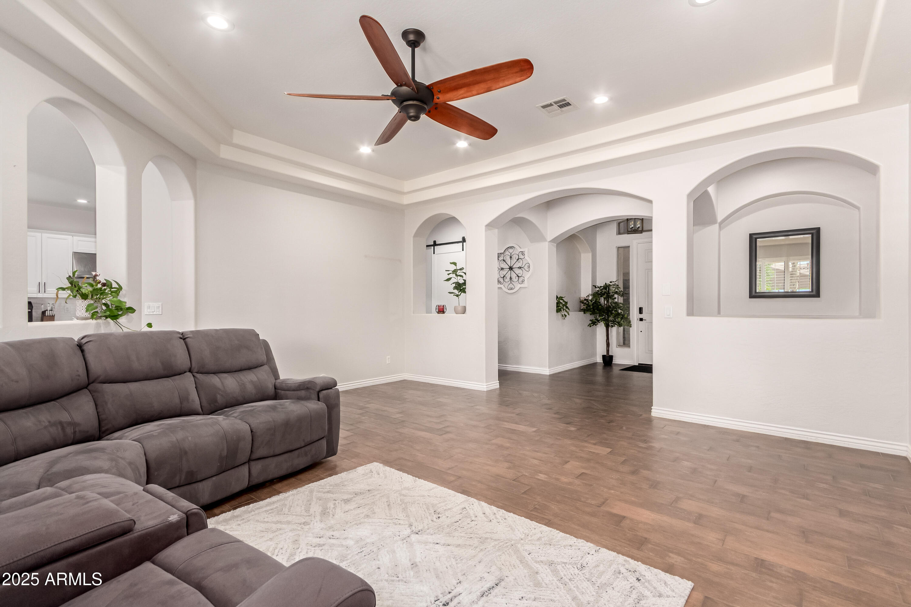 4584 East Reins Road Gilbert, AZ 85297 - Photo 8 of 58 a living room with furniture