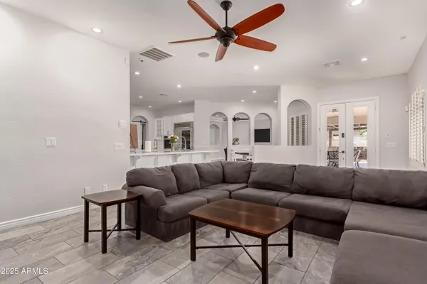 a living room with fireplace and a flat screen tv