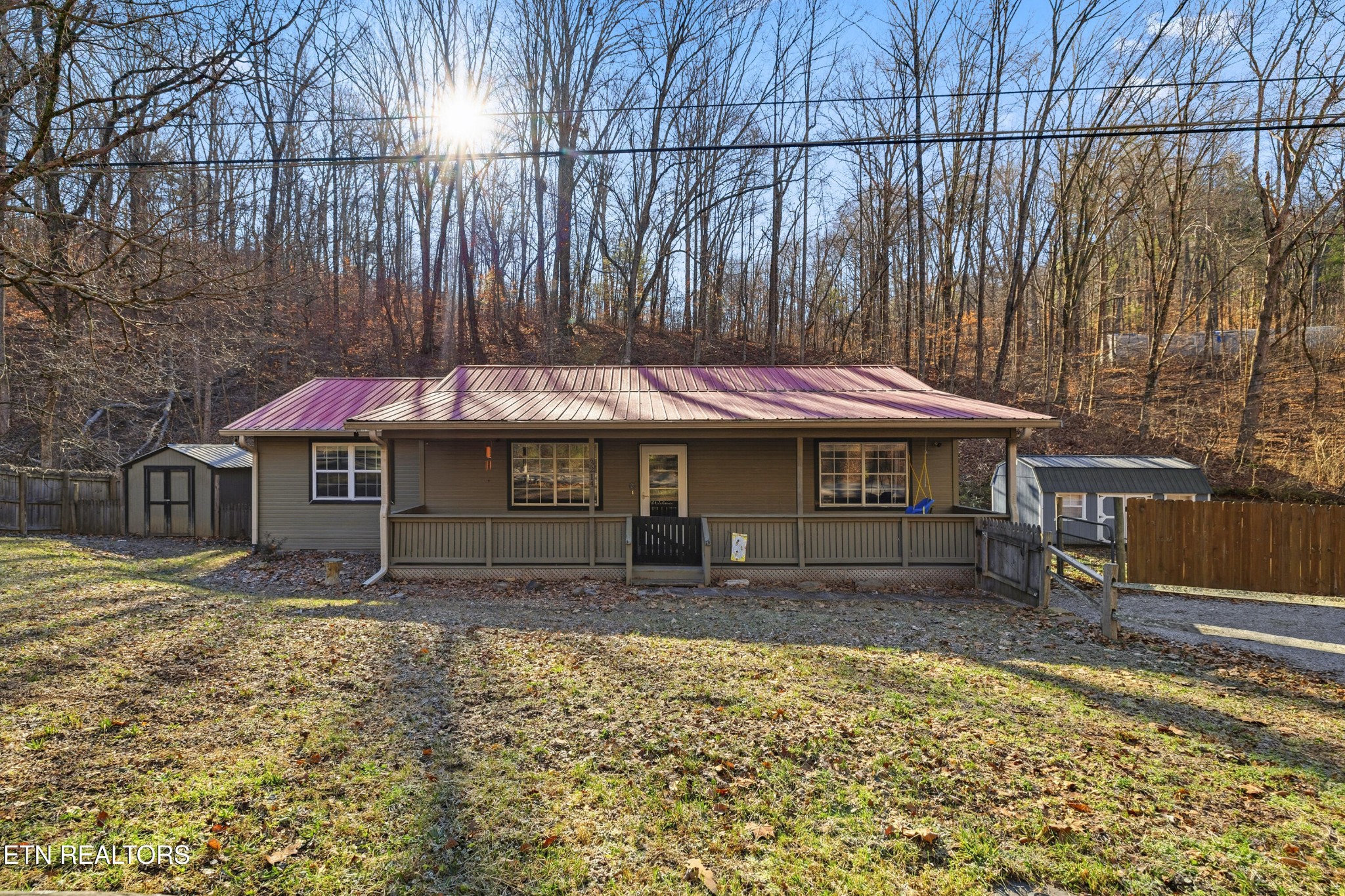 3214 Long Hollow Road Powell, TN 37849 - Photo 1 of 23 a front view of a house with a yard