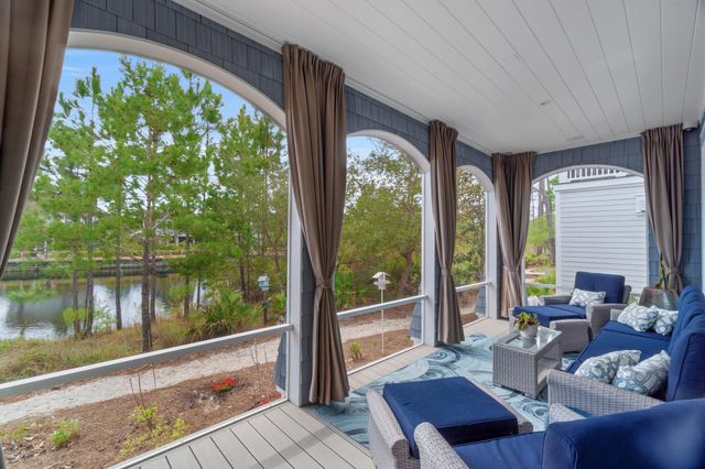 a view of a lake with a house in the background