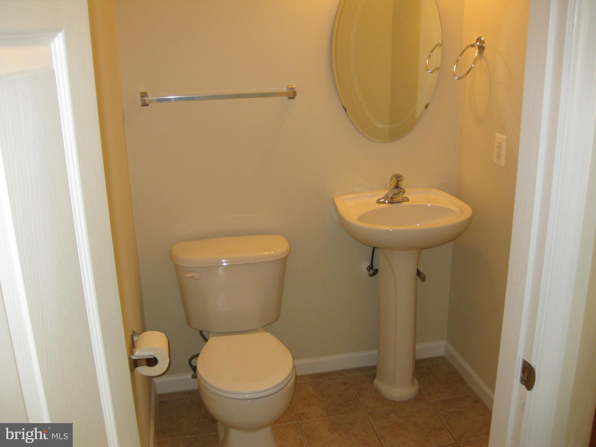 1252 Steed Street Ranson, WV 25438 - Photo 11 of 36 a bathroom with a sink and toilet