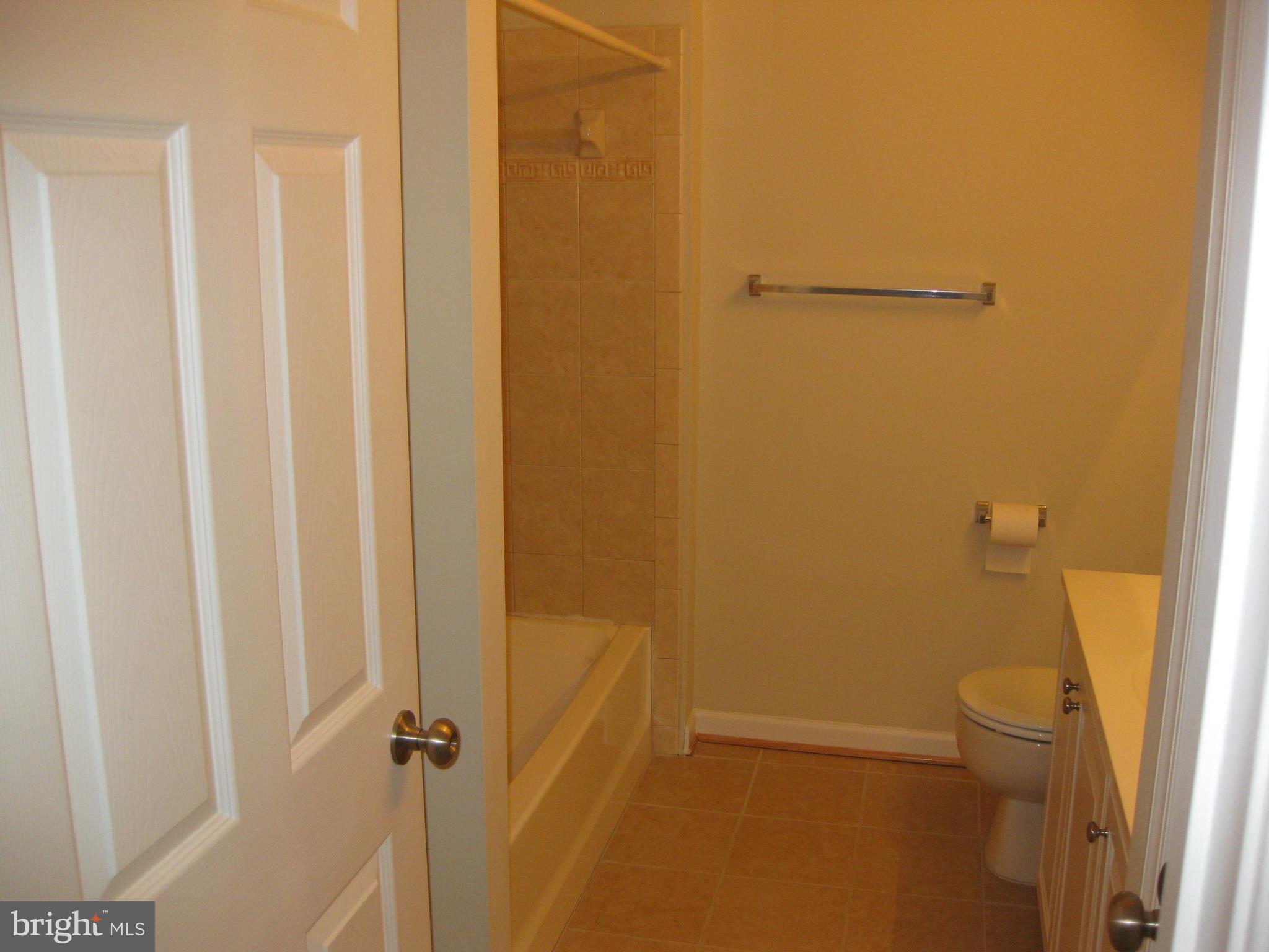1252 Steed Street Ranson, WV 25438 - Photo 20 of 36 a bathroom with a toilet and a shower