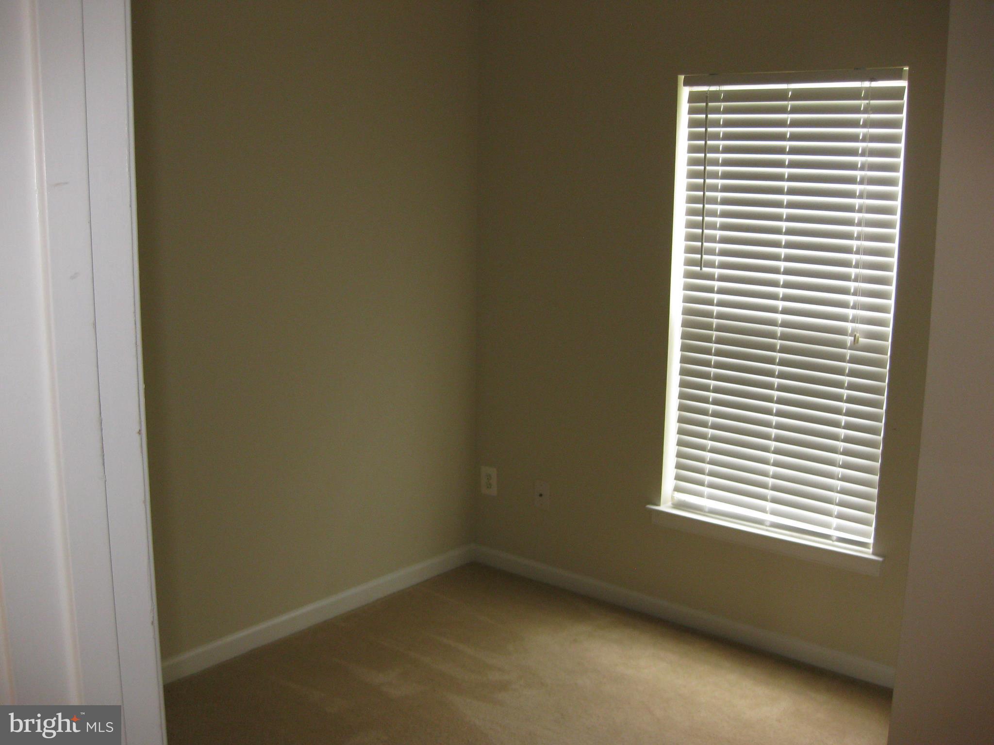 1252 Steed Street Ranson, WV 25438 - Photo 24 of 36 a view of an empty room with a window