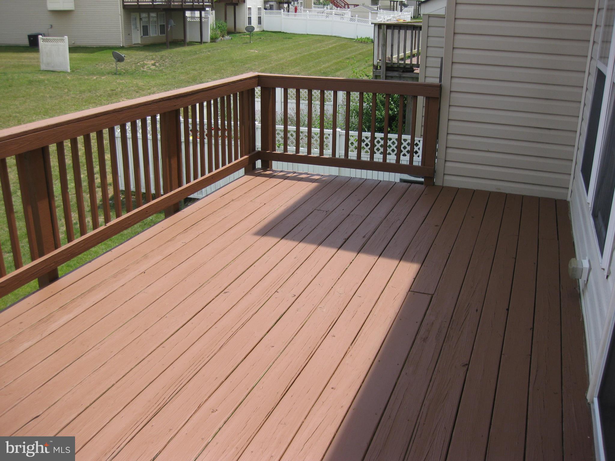 1252 Steed Street Ranson, WV 25438 - Photo 5 of 36 a balcony with wooden floor