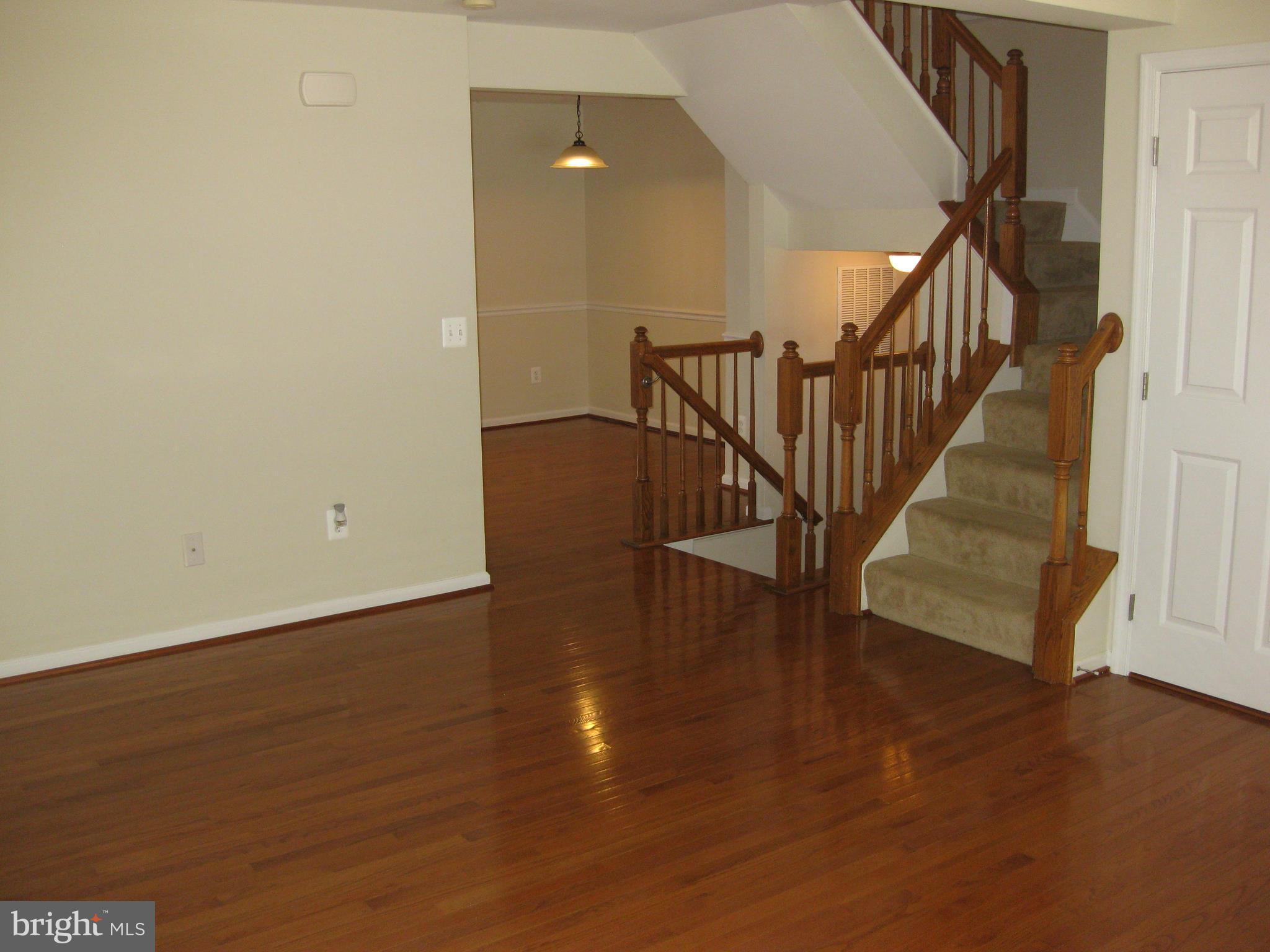 1252 Steed Street Ranson, WV 25438 - Photo 9 of 36 a view of entryway with wooden floor