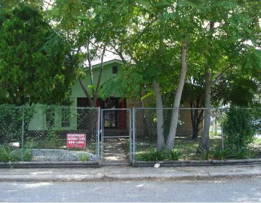 a sign that is sitting on a middle of a street