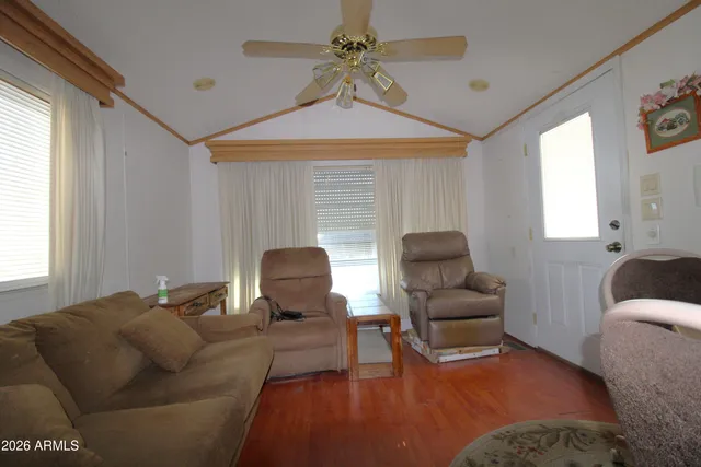 a living room with furniture and a window