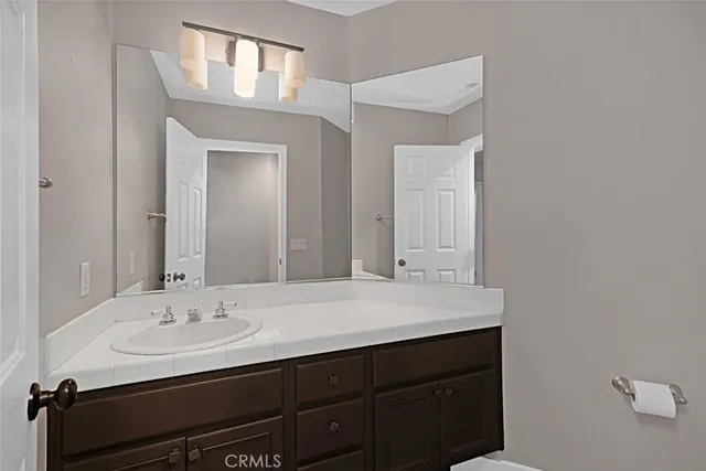 a view of storage and utility room with washer and dryer