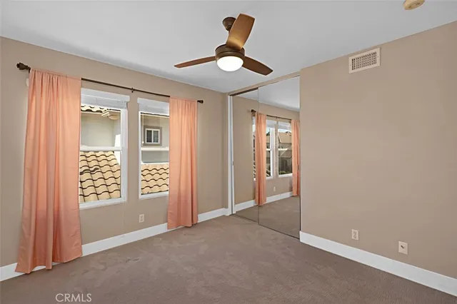 a bathroom with a double vanity sink mirror and double