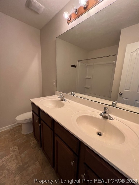 251 Botanical Court Bunnlevel, NC 28323 - Photo 11 of 20 a bathroom with a sink and a mirror
