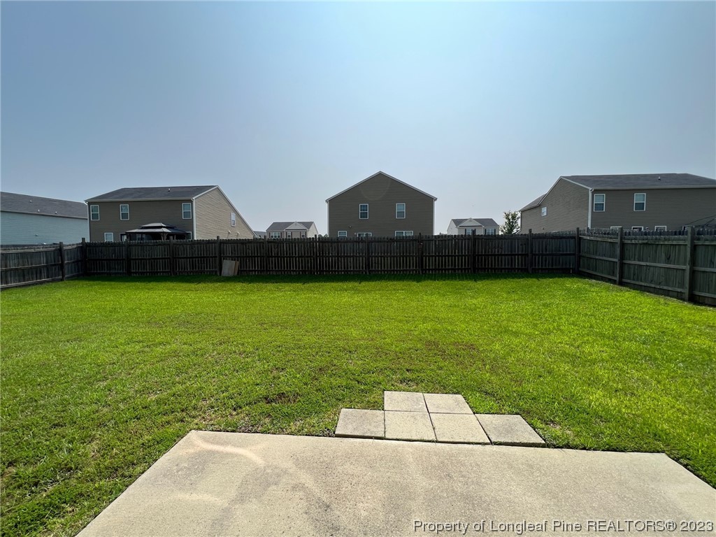 251 Botanical Court Bunnlevel, NC 28323 - Photo 19 of 20 a view of a patio with a yard