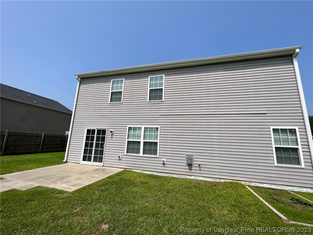 251 Botanical Court Bunnlevel, NC 28323 - Photo 20 of 20 a backyard of a house