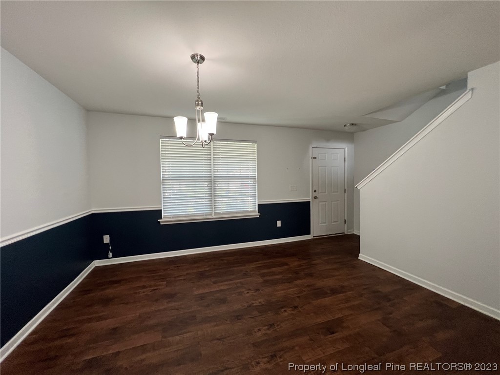 251 Botanical Court Bunnlevel, NC 28323 - Photo 2 of 20 wooden floor in an empty room with a window