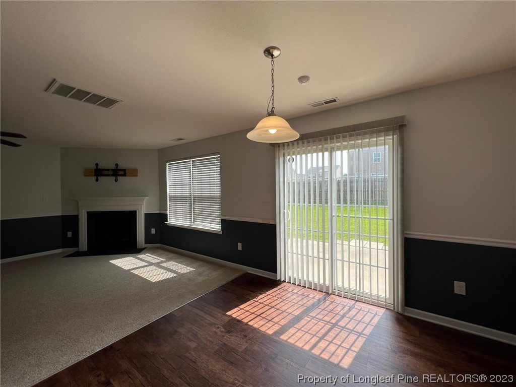 251 Botanical Court Bunnlevel, NC 28323 - Photo 4 of 20 a view of an empty room with glass door