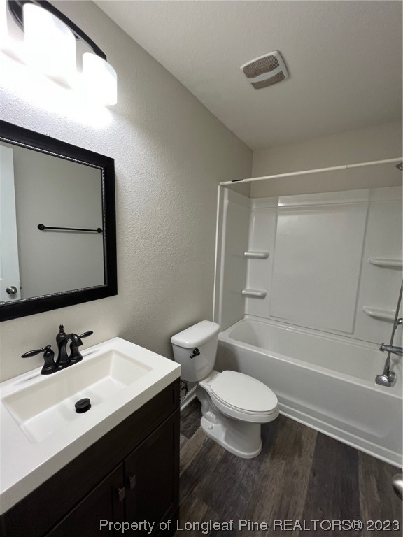251 Botanical Court Bunnlevel, NC 28323 - Photo 8 of 20 a bathroom with a sink a toilet a mirror and shower